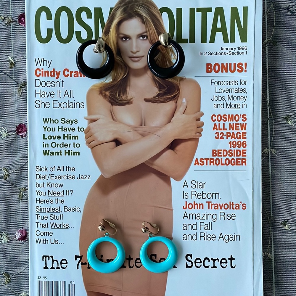 Vintage clip on dangling hoops.